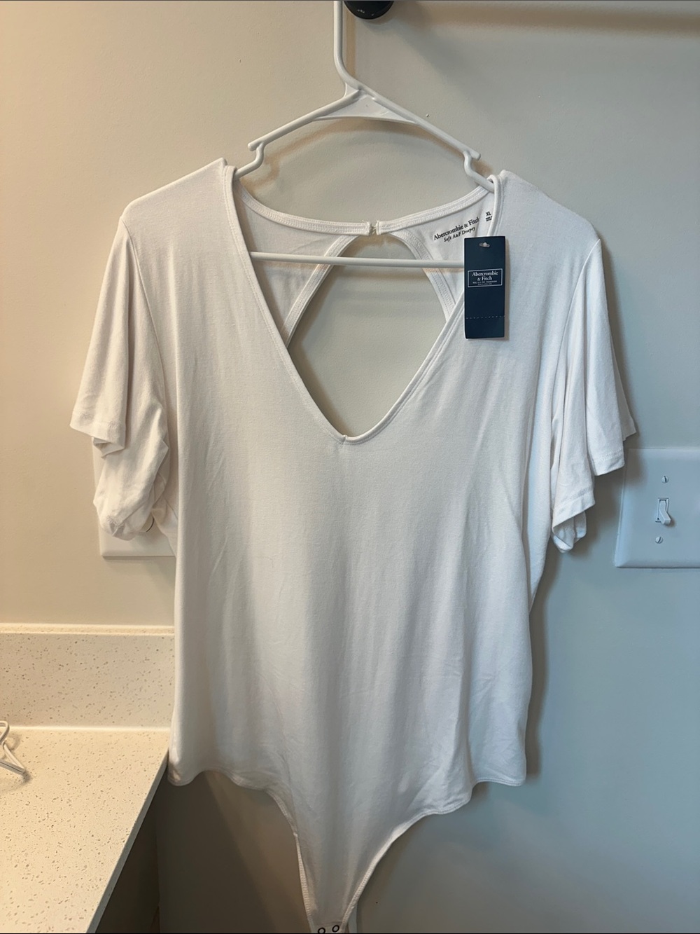 White V-Neck Bodysuit Top
